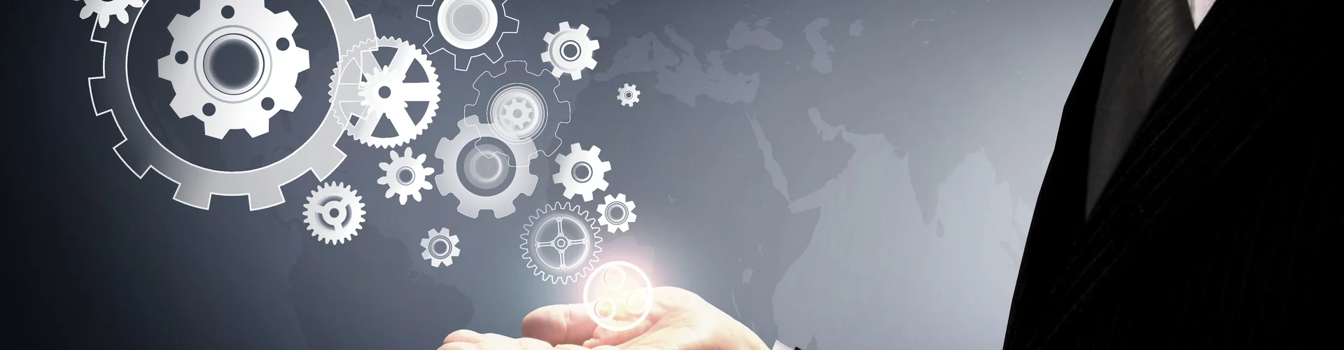 businessman-holding-virtual-cogwheels-business-and-work