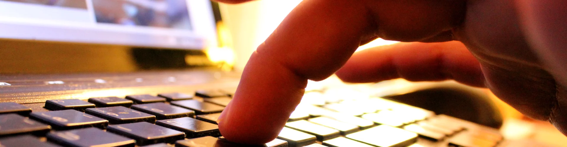 hands-typing-on-laptop-keyboard